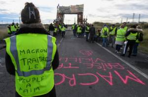 French government yields on fuel price hikes after weeks of protest.jpg French government yields on fuel price hikes after weeks of protest.jpg