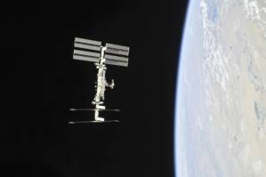Russian spacewalkers take sample of mystery hole at space station.jpg Russian spacewalkers take sample of mystery hole at space station.jpg