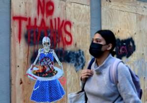 LA shuts restaurants as virus surges, but Europe lockdowns to ease.jpg