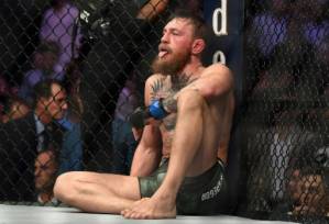 Poirier knocks out McGregor in stunning UFC upset.jpg