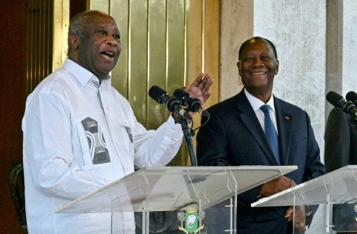 Conflict 'behind us', Ivory Coast's Ouattara says after greeting rival