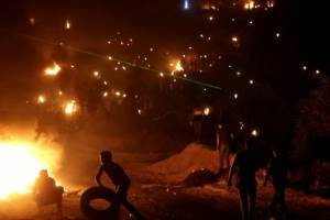 Palestinians smoke out settlers.jpg Palestinians smoke out settlers.jpg