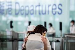 Airport echoes with sobs and farewells in Hong Kong exodus.jpg Airport echoes with sobs and farewells in Hong Kong exodus.jpg