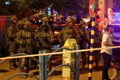 Israel launches manhunt after attack kills three
