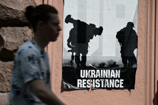 10 dead in Ukraine apartment strike, after Russia quits Snake Island
