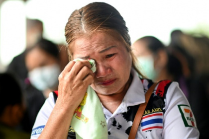 Families mourn Thai nursery dead ahead of king's visit.jpg Families mourn Thai nursery dead ahead of king's visit.jpg
