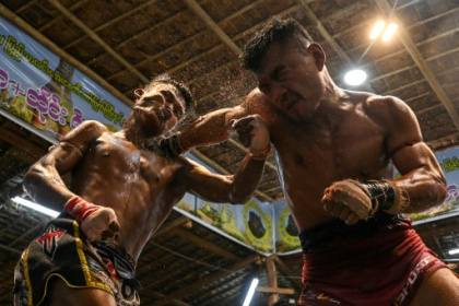 Myanmar traditional boxing packs a punch, kick and headbutt.jpg Myanmar traditional boxing packs a punch, kick and headbutt.jpg
