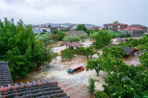 Torrential rains kill one in Greece after wildfires