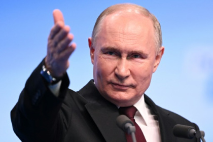 Putin vows Russia cannot be held back in victory speech.jpg