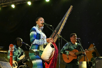 Breaking men-only musical lore, Jobarteh puts African kora on wider stage.jpg