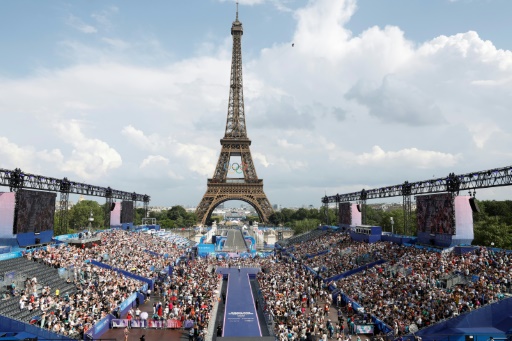 After months of grumbling, Parisians join the Olympics party