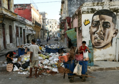 Trash overwhelms Havana as garbage trucks lack parts, fuel.jpg