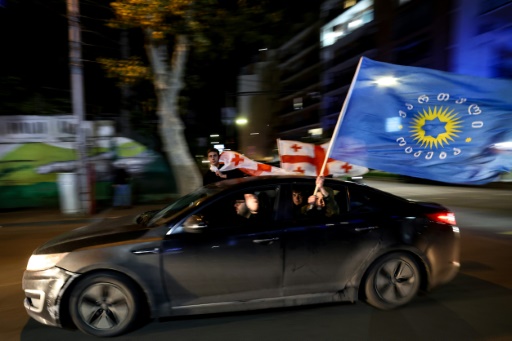 Georgia opposition calls election results protests as president accuses Russia