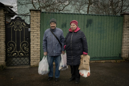 'Prices are going up every day,' said Viktor Markov, returning from shopping with his wife