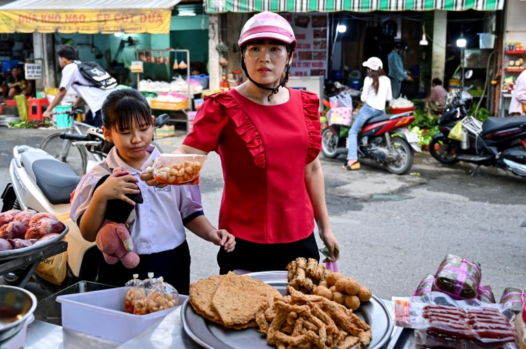 'Too hard': Vietnam's factory workers return to country life