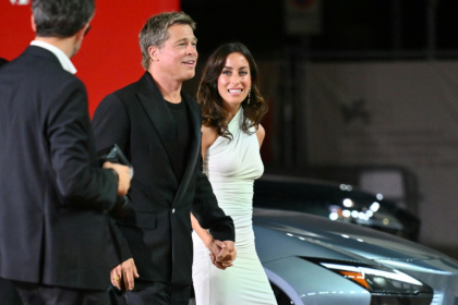 The woman believed she was in a relationship with Brad Pitt (C) until news emerged of his new girlfriend, Ines de Ramon (L)