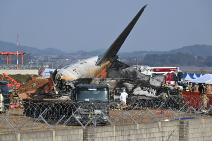 A Jeju Air plane crashed landed and exploded after slamming into a concrete barrier at Muan International Airport, raising questions about why the barrier was at the end of the runway