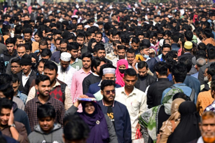 Job applicants leave an exam center after a written test in Dhaka. Some who helped overthrow the government say finding a job is harder than manning the barricades