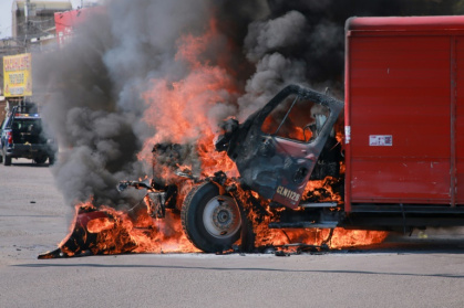 A truck burns in the Mexican cartel stronghold of Culiacan, which has been hit by gang infighting, murders and arson