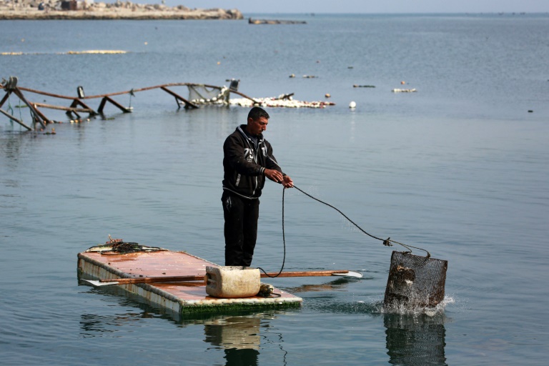 Boatless in Gaza: using old fridge doors to catch fish