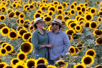 A couple smile during the sunset in Tlajomulco de Zuniga, Mexico