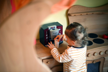 A girl plays in a day care centre in Recklinghausen, western Germany on February 24, 2021