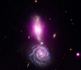 Two galaxies merging with each other -- a cataclysmic fate that could await our home Milky Way - - (AFP) Two galaxies merging with each other -- a cataclysmic fate that could await our home Milky Way - - (AFP)