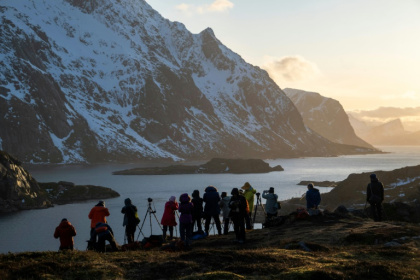 Tourists photograph a fjord in Norway's Lofoten Islands - Olivier MORIN (AFP) Tourists photograph a fjord in Norway's Lofoten Islands - Olivier MORIN (AFP)