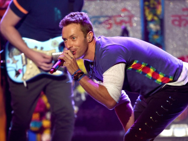 Coldplay's Chris Martin said after the canoodling couple were featured on the jumbotron: "Either they're having an affair or they're just very shy" - KEVIN WINTER (AFP)
