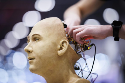 A man works on the electronics of Jules, a humanoid robot from Hanson Robotics using AI, at the recent International Telecommunication Union AI for Good Global Summit in Geneva - Valentin FLAURAUD (AFP) A man works on the electronics of Jules, a humanoid robot from Hanson Robotics using AI, at the recent International Telecommunication Union AI for Good Global Summit in Geneva - Valentin FLAURAUD (AFP)
