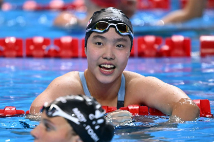Yu Zidi is at the world championships aged 12 - Oli SCARFF (AFP)