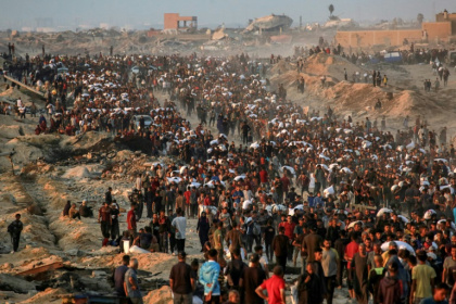 Palestinians facing deadly shortages in Gaza gather to recover food from aid convoys - BASHAR TALEB (AFP) Palestinians facing deadly shortages in Gaza gather to recover food from aid convoys - BASHAR TALEB (AFP)