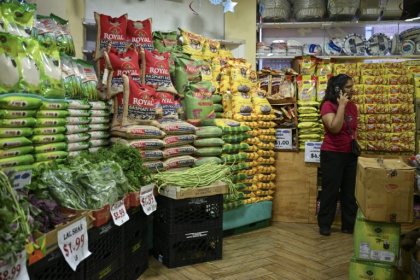 A person stands in a supermarket in the ‘Little India’ neighborhood of New York City - Janis LATVELS, John SAEKI (AFP) A person stands in a supermarket in the ‘Little India’ neighborhood of New York City - Janis LATVELS, John SAEKI (AFP)