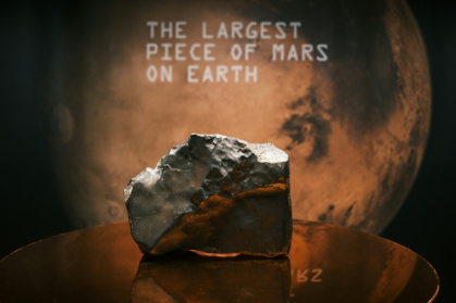The 54-pound Martian meteorite NWA 16788, the largest known piece of Mars ever discovered on Earth, was sold for a record $5.3 million at Sotheby's New York - CHARLY TRIBALLEAU (AFP) The 54-pound Martian meteorite NWA 16788, the largest known piece of Mars ever discovered on Earth, was sold for a record $5.3 million at Sotheby's New York - CHARLY TRIBALLEAU (AFP)