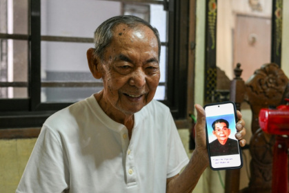 Jose Villafuerte shows a photo of his father Ginjiro Takei, a Japanese imperial army officer, at his home in San Pablo, Laguna - Jam STA ROSA (AFP) Jose Villafuerte shows a photo of his father Ginjiro Takei, a Japanese imperial army officer, at his home in San Pablo, Laguna - Jam STA ROSA (AFP)