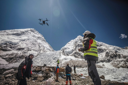 A man operates a heavy-lift drone to clear trash dumped at the Everest Base Camp - - (AFP) A man operates a heavy-lift drone to clear trash dumped at the Everest Base Camp - - (AFP)