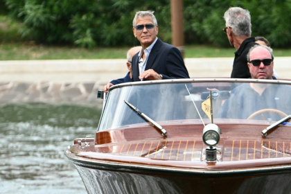 George Clooney travelling in style on Wednesday in Venice - Stefano RELLANDINI (AFP) George Clooney travelling in style on Wednesday in Venice - Stefano RELLANDINI (AFP)