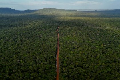 This aerial view shows 'The Trail,' a historic red dirt route through Guyana, which officials are hoping to turn into a major highway that can transform the country's economy - Joaquin Sarmiento (AFP) This aerial view shows 'The Trail,' a historic red dirt route through Guyana, which officials are hoping to turn into a major highway that can transform the country's economy - Joaquin Sarmiento (AFP)