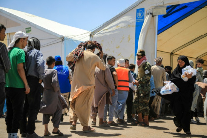 Newly arrived Afghan migrants from Iran queue to receive food packages at the Islam Qala border crossing in Herat. A massive spike in millions of migrants could fuel Islamic State militancy, diplomatic and security sources fear - Mohsen KARIMI (AFP) Newly arrived Afghan migrants from Iran queue to receive food packages at the Islam Qala border crossing in Herat. A massive spike in millions of migrants could fuel Islamic State militancy, diplomatic and security sources fear - Mohsen KARIMI (AFP)