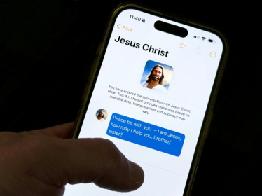“Text With Jesus,” a religion-based chatbot displayed on this iPhone, has thousands of paying subscribers and lets users ostensibly ask questions of Mary, Joseph, Jesus and nearly all 12 apostles - AFP PHOTO (AFP)