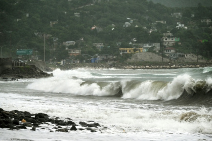 'Life-threatening' storm surges are expected in Hurricane Melissa's path - Ricardo Makyn (AFP)