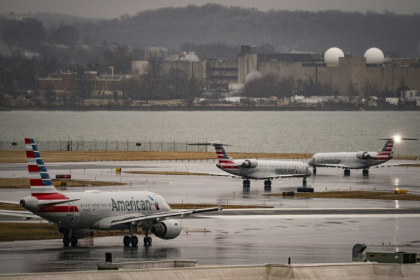 The US Department of Justice has responded to a civil lawsuit brought over a deadly air collision outside Washington in January 2025 - Al Drago (AFP)