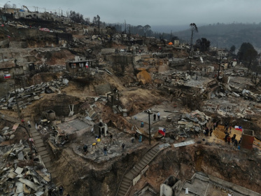 Aerial view showing the charred remains of destroyed homes after a wildfire ravaged Lirquen, a town in Penco near the city of Concepcion, Chile, on January 20, 2026 - Raul BRAVO (AFP)