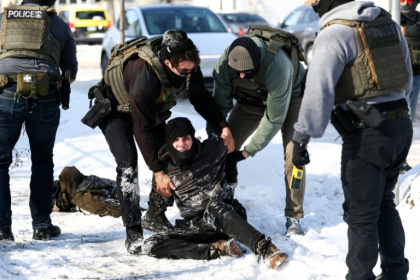 Federal agents detain a protester in Minneapolis, Minnesota on February 3, 2026 - Charly TRIBALLEAU (AFP)