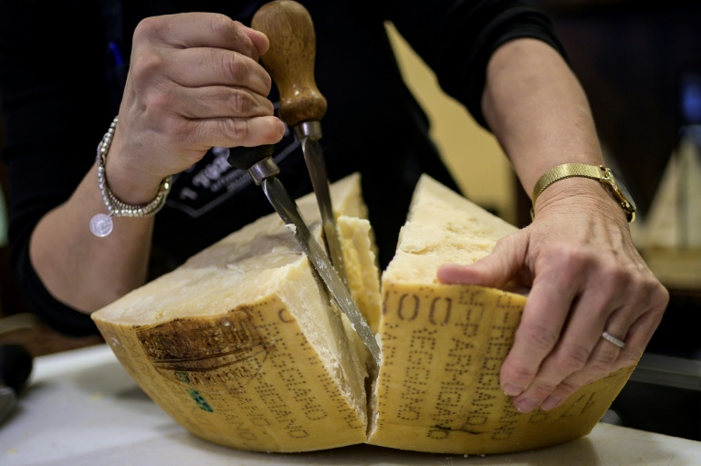 Parmesan exports doing grate... but sales melt in Italy