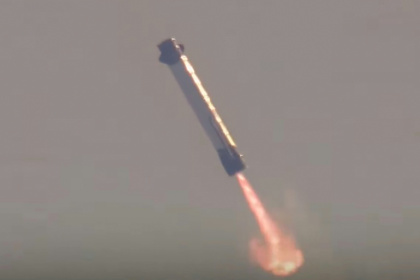 This screen grab taken from a Blue Origin broadcast shows the booster of Blue Origin's New Glenn rocket preparing to land on a floating platform in the Atlantic Ocean - - (AFP)