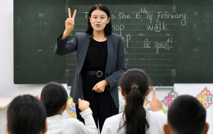 The poor Central Asian nation is battling to modernise its Soviet-era education system - Vyacheslav OSELEDKO (AFP)