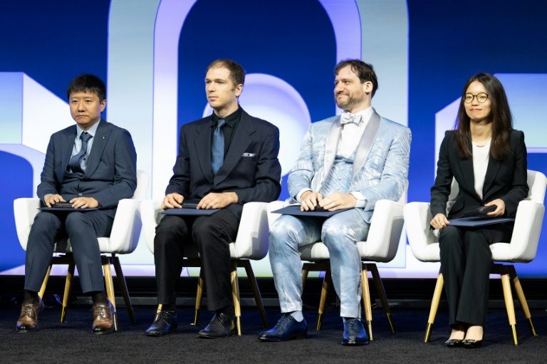 Fields medal awarded to four young mathematicians