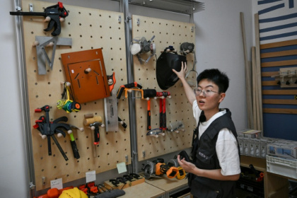 Chen Ning, founder of Mulan Build, says it is 'incredibly difficult' for women to break into the home repair industry - Pedro PARDO (AFP)