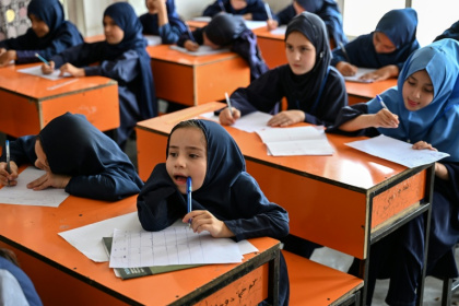 Best days of their lives: Afghan girls taking their midterm exams at a primary school in Kabul - Photographe inconnu (AFP)